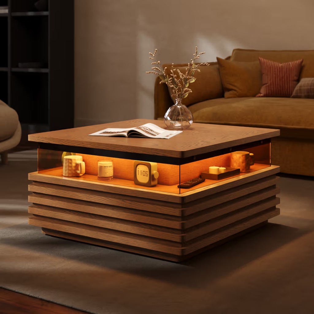 Walnut slatted LED coffee table with warm illuminated display storage and decorative objects in a cozy modern living room.