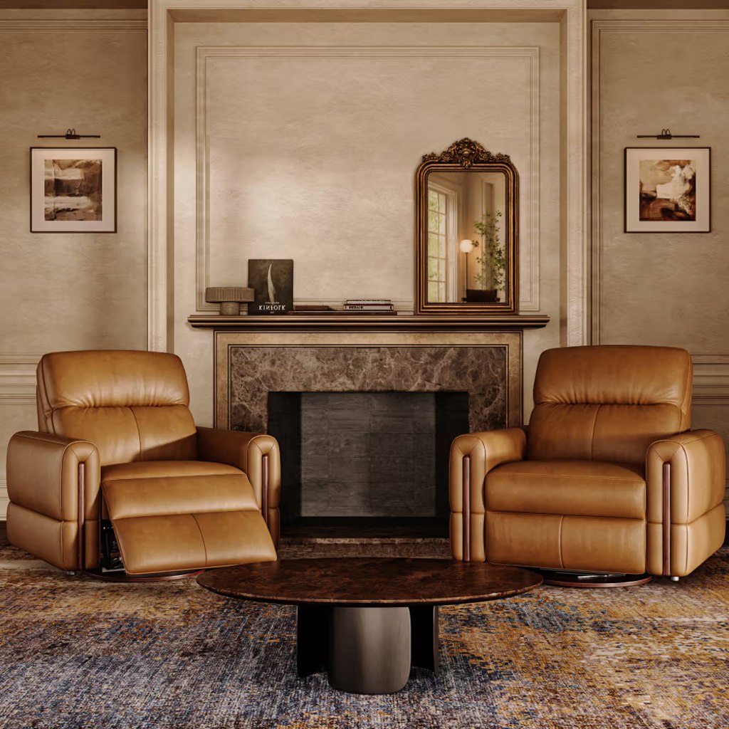 Two brown leather recliner armchairs in a classic living room, with one chair reclined and the other upright.