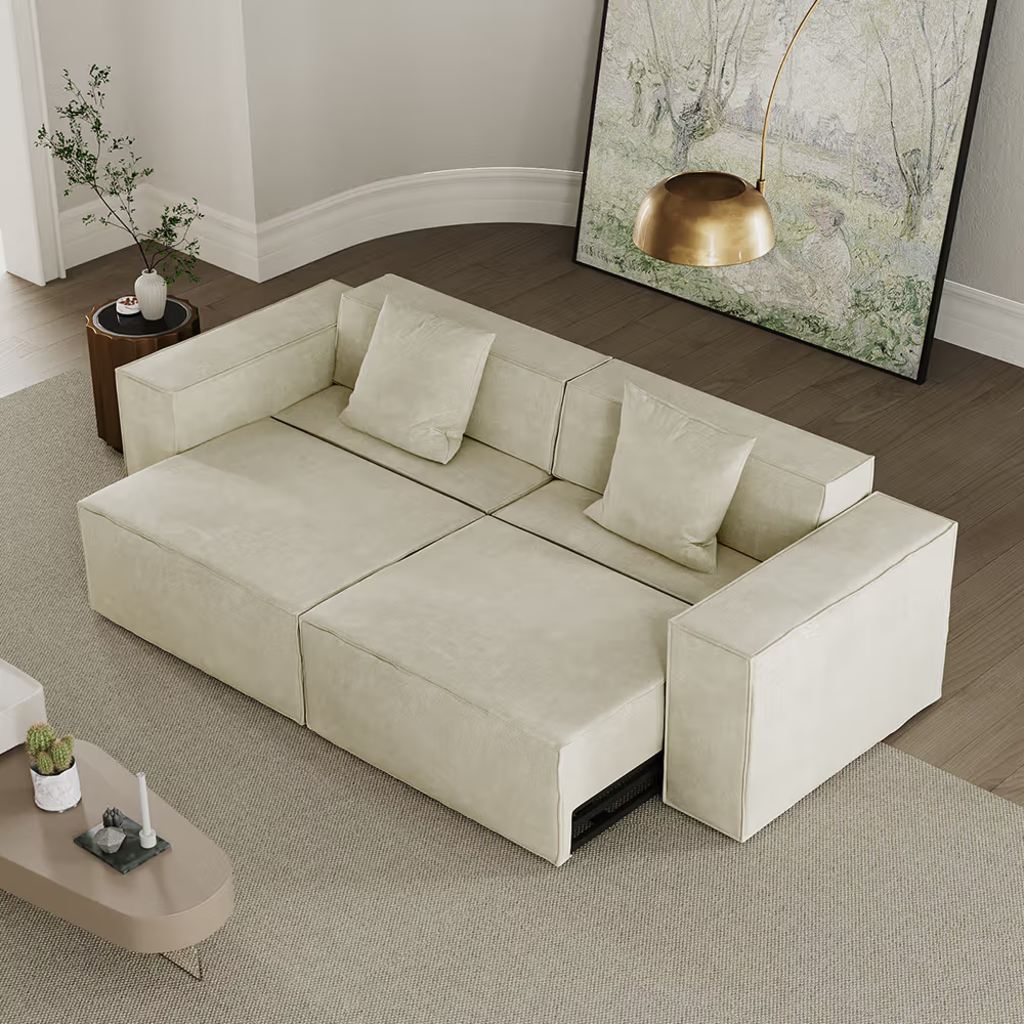 Cream power reclining sofa with extended seats in a modern neutral living room.