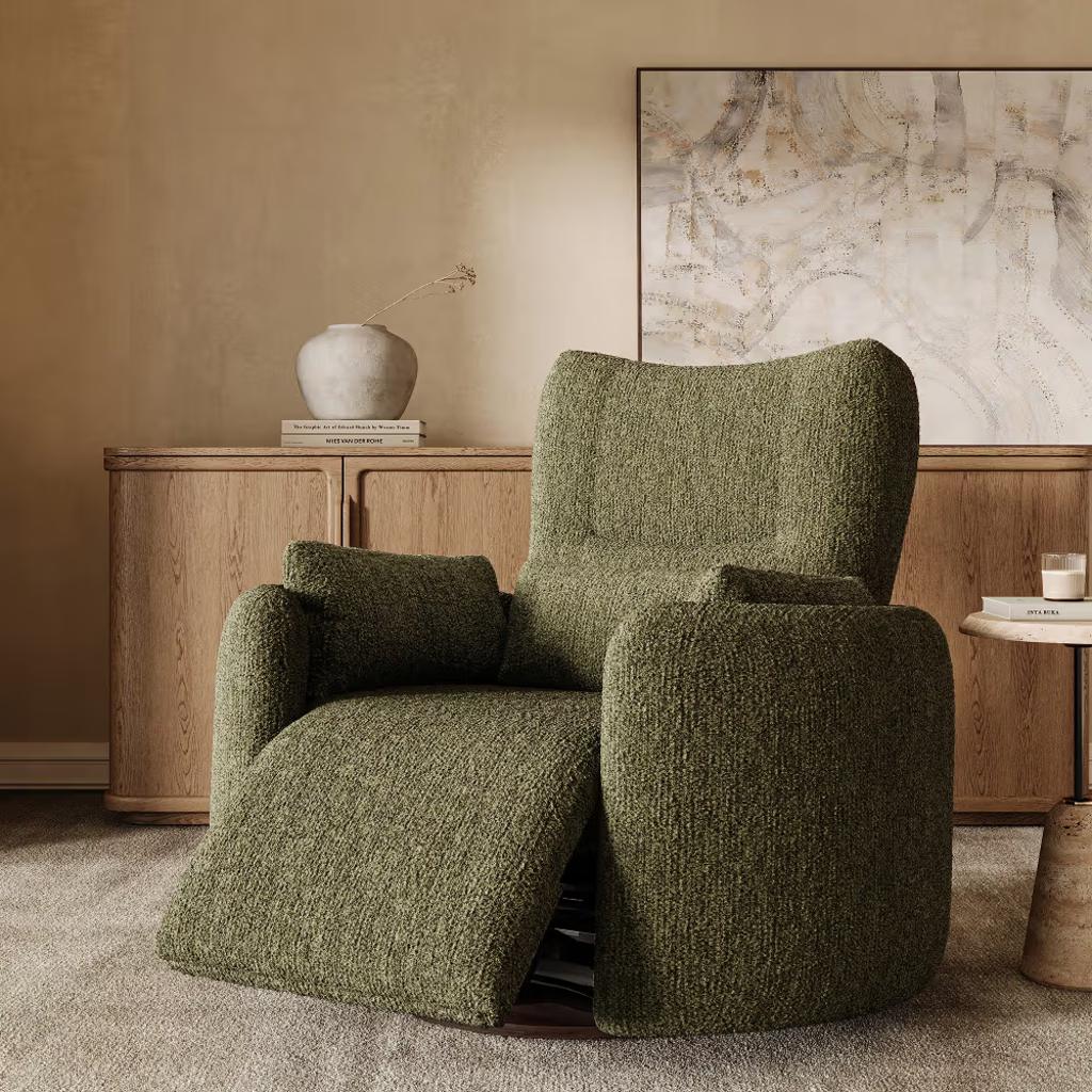 Olive green upholstered power recliner with an extended footrest in a warm modern living room.
