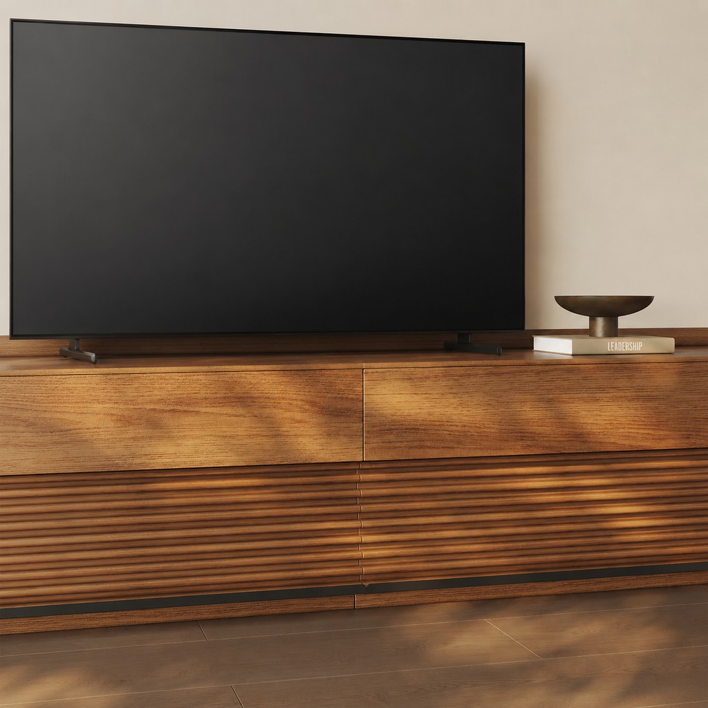 75-inch TV on a low-profile wooden media console in a warm minimalist living room.
