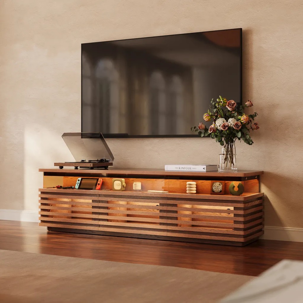Walnut slatted media console with a Nintendo Switch, turntable, and wall-mounted TV.