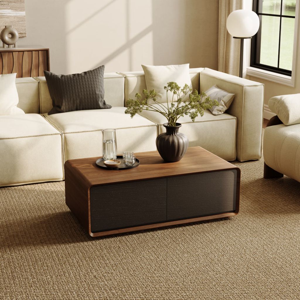 Rectangular walnut coffee table with dark storage drawers in front of a cream sectional sofa.