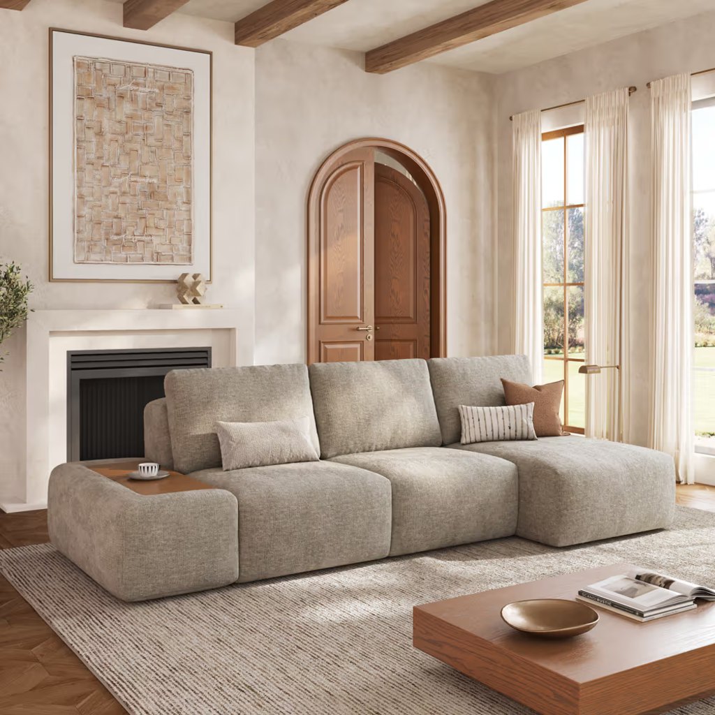 Beige Moku modular block sofa with chaise and built-in side table in a warm modern living room
