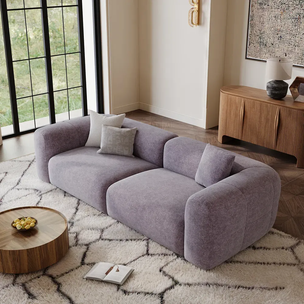 Modular sofa with a low sculptural profile in a contemporary living room.