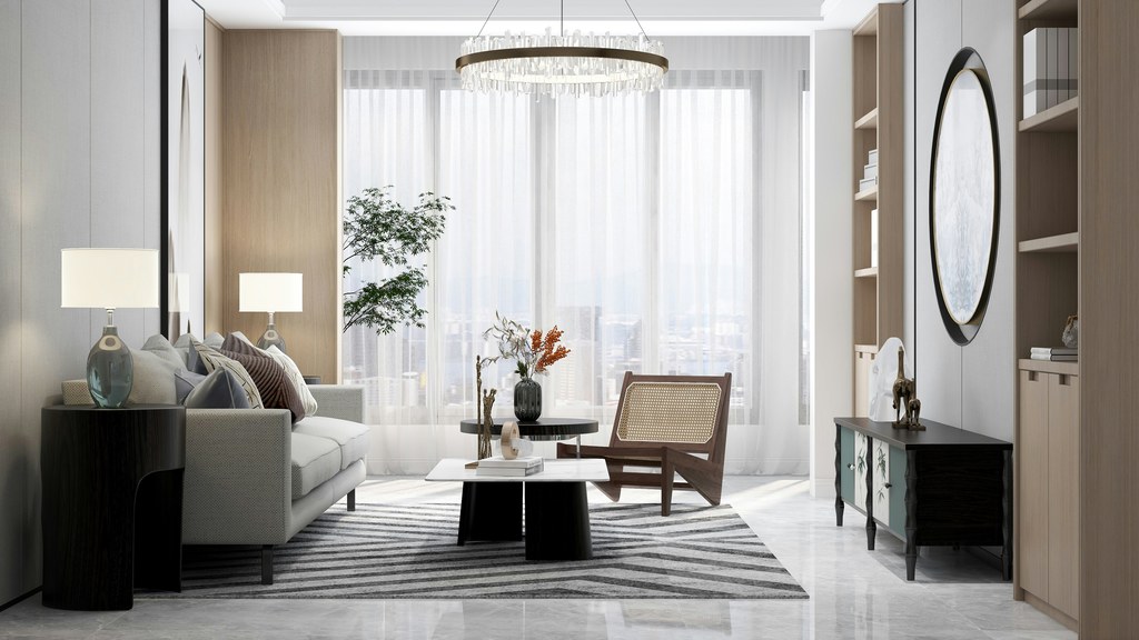 Light and airy living room with floor-to-ceiling sheer curtains, neutral sofa, wood accent chair, round mirror, and layered lighting.