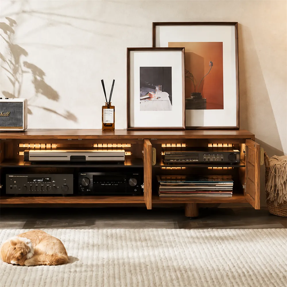 Wooden media console with AV receivers, speakers, vinyl records, and open storage compartments.
