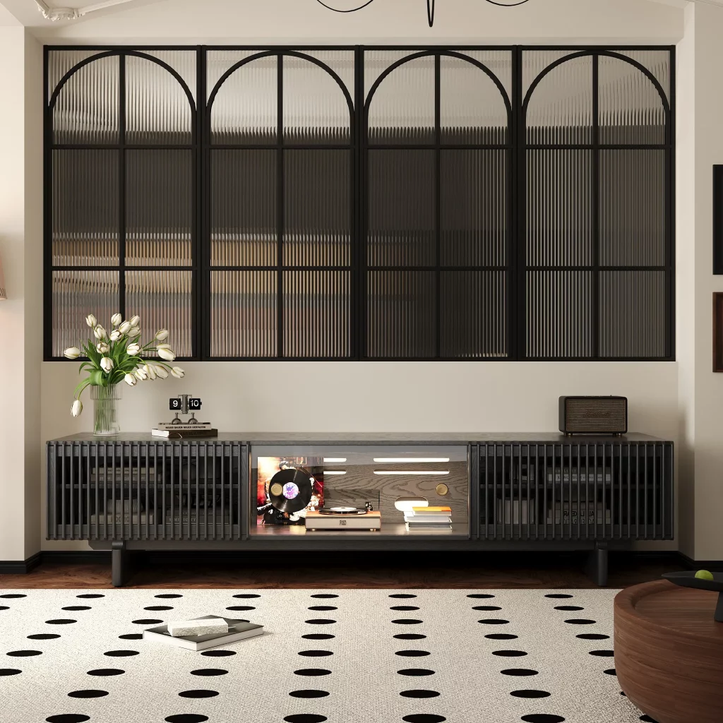 Black slatted media console with turntable, vinyl records, and audio equipment in a contemporary living room.