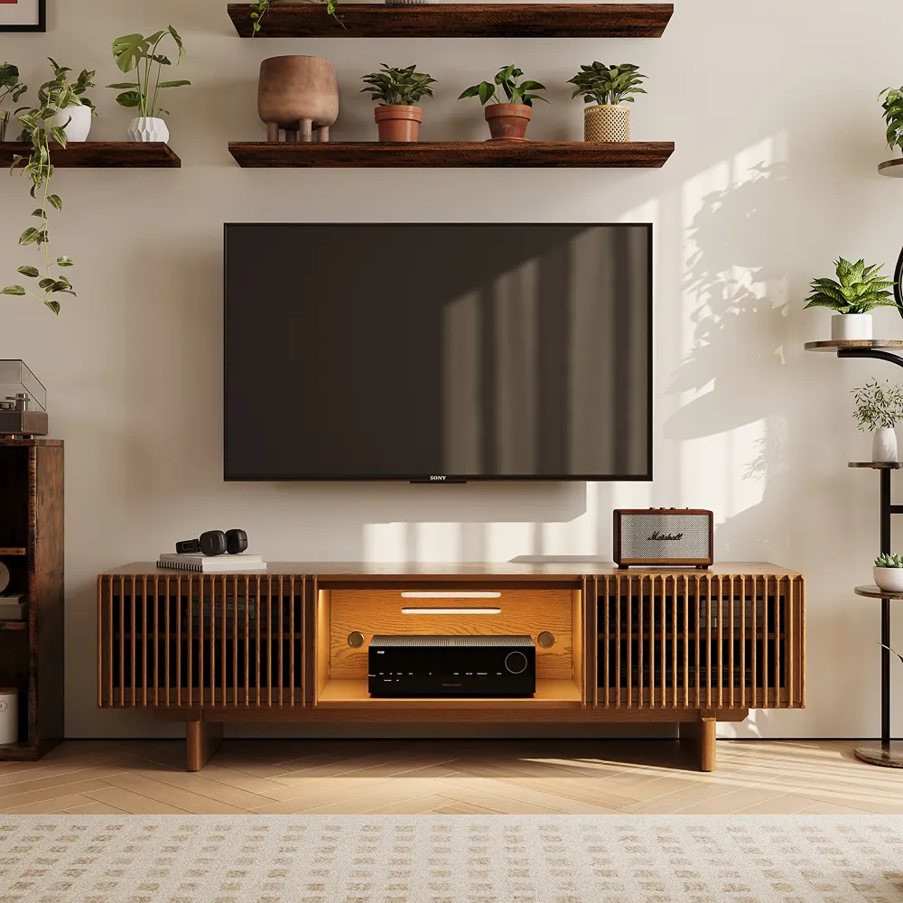 Modern TV stand with cable management, AV receiver, and open ventilation design beneath a wall-mounted TV