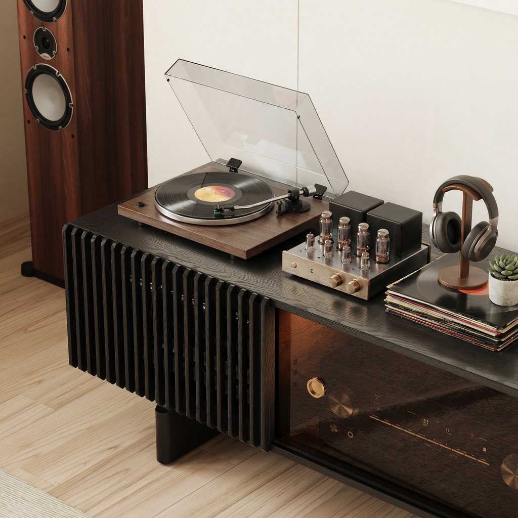 Dark slatted media console with a turntable, tube amplifier, headphones, records, and audio equipment.
