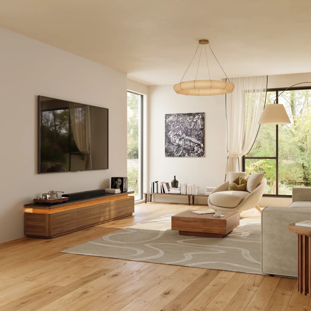 Modern Wabi Sabi living room with a low wood TV stand, neutral seating, curved furniture, and large windows with natural light.