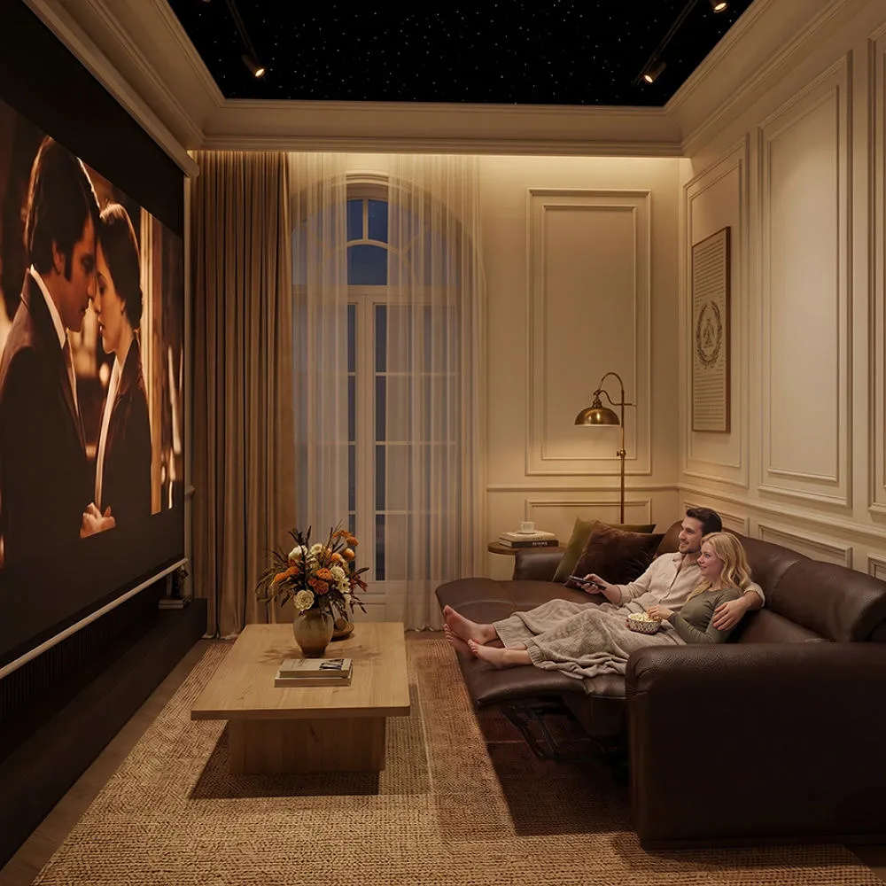 Couple relaxing on a brown leather reclining sofa while watching a movie in a home theater