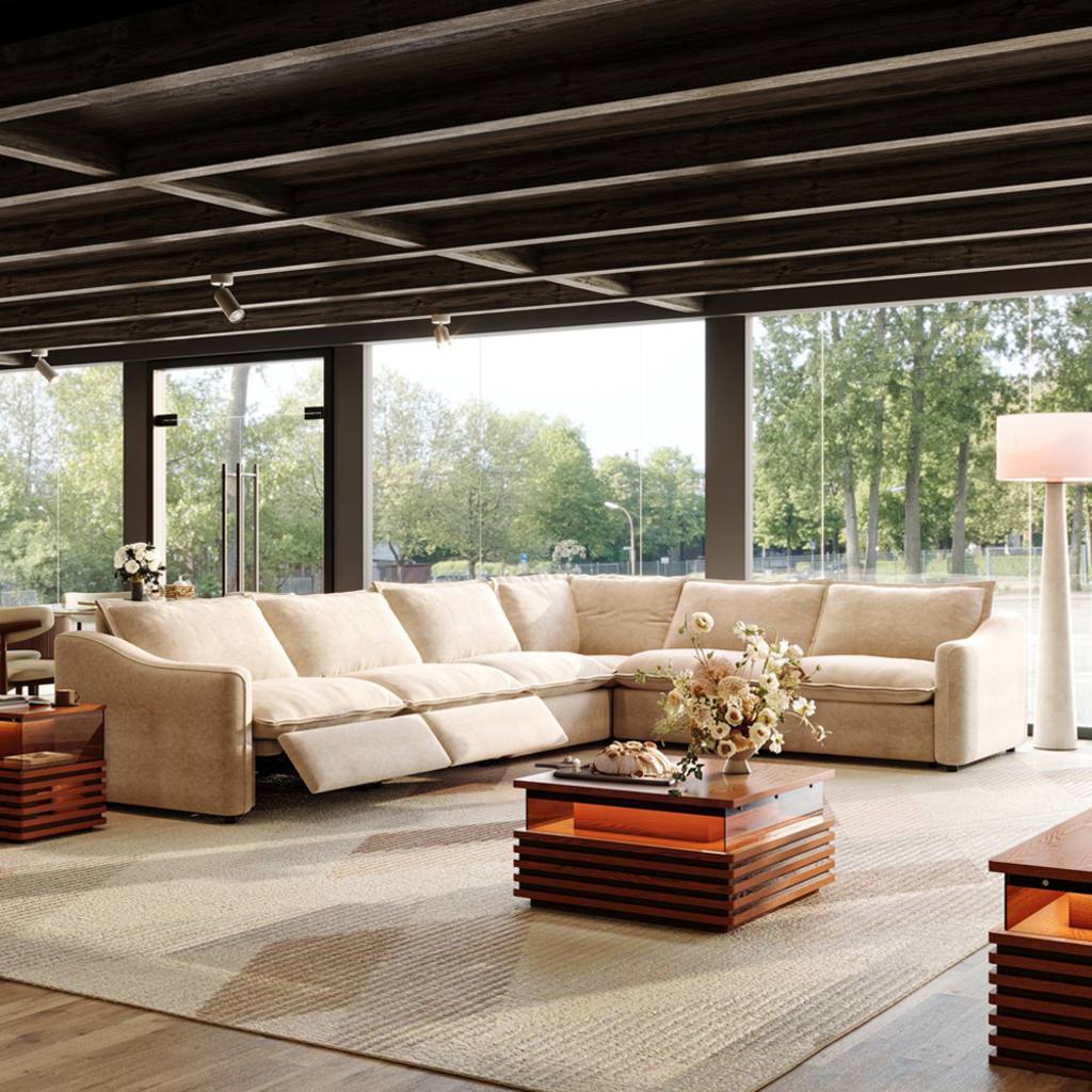 Oversized beige reclining sectional sofa with wide seating in a spacious modern living room.