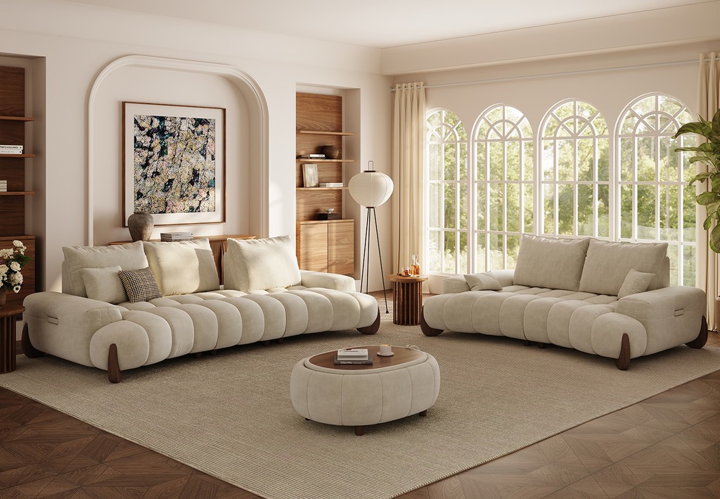 Modern Mediterranean living room with cream sofas, arched windows, warm wood shelving, neutral woven rug, and soft natural light.