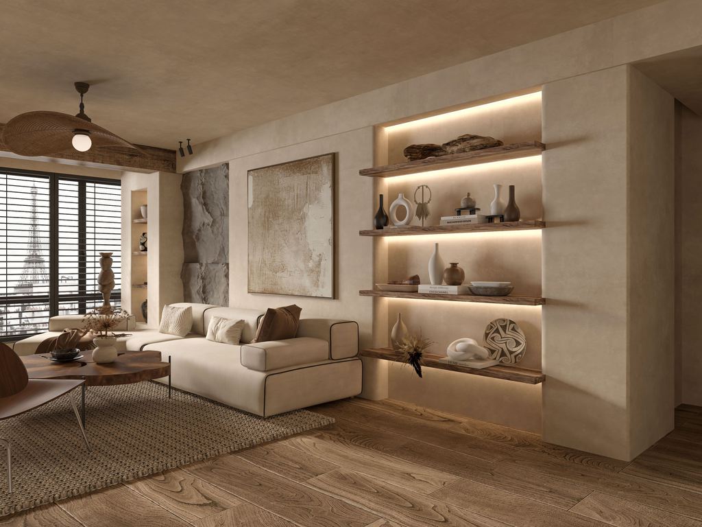 Modern Mediterranean living room with a cream sofa, warm wood flooring, textured beige walls, open shelving, and neutral ceramic decor.