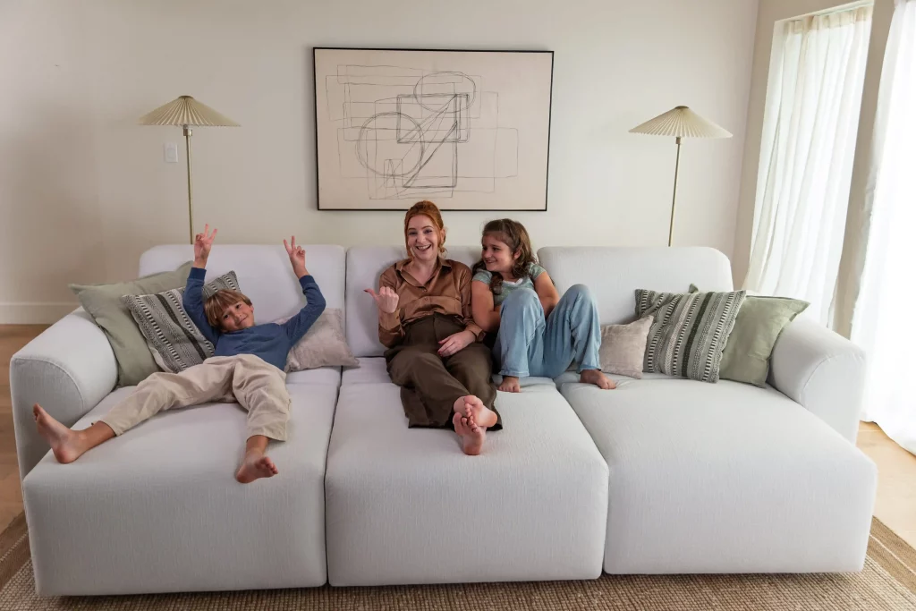 family having fun on Aurora sofa bed
