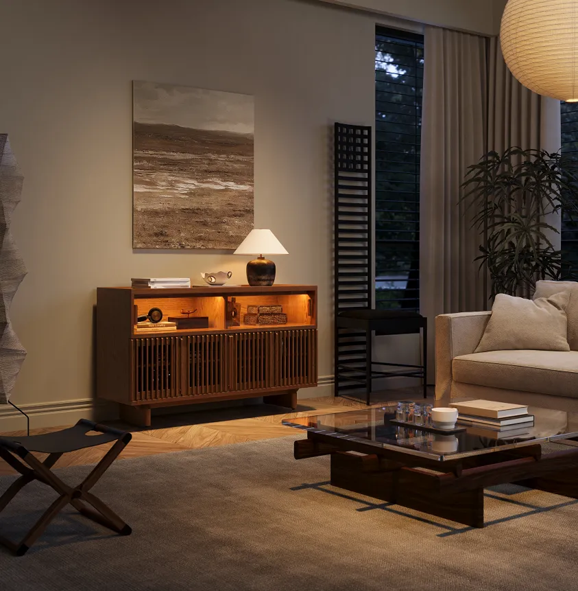 Modern living room with a wooden cabinet, wall art, floor lamp, glass coffee table, and neutral seating area.