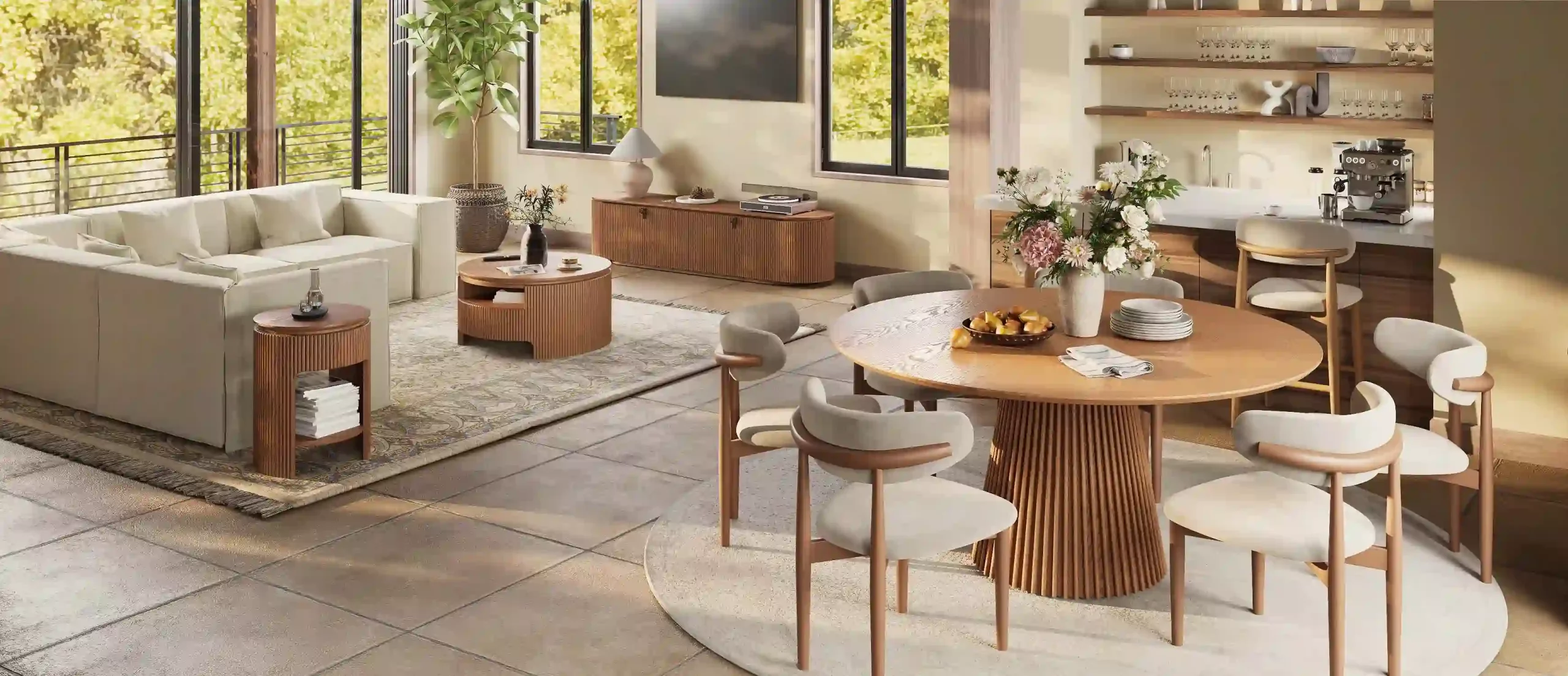 Modern open-concept living and dining room with a round wooden dining table, upholstered chairs, white sectional sofa, and matching coffee table.