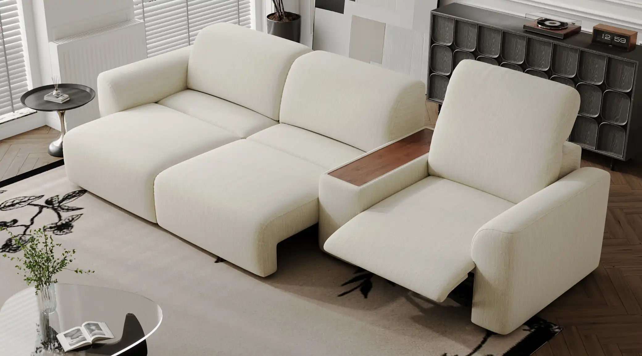 Cream power sofa with an extended chaise-style seat and adjustable recliner in a modern living room.