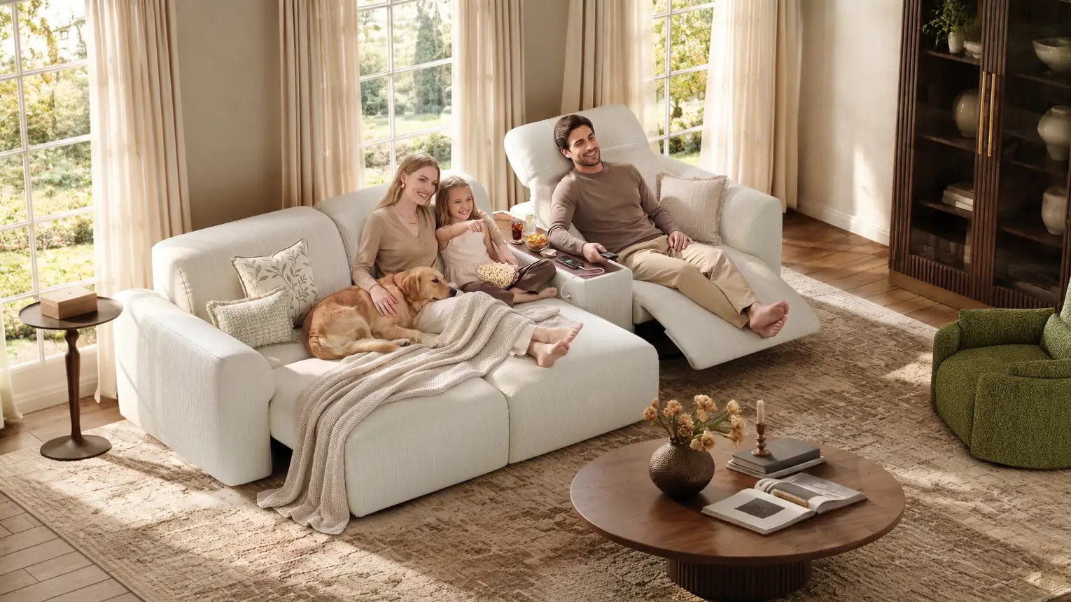 Family relaxing with their dog on a white modular sofa bed with extended seats and adjustable headrests in a bright, modern living room.