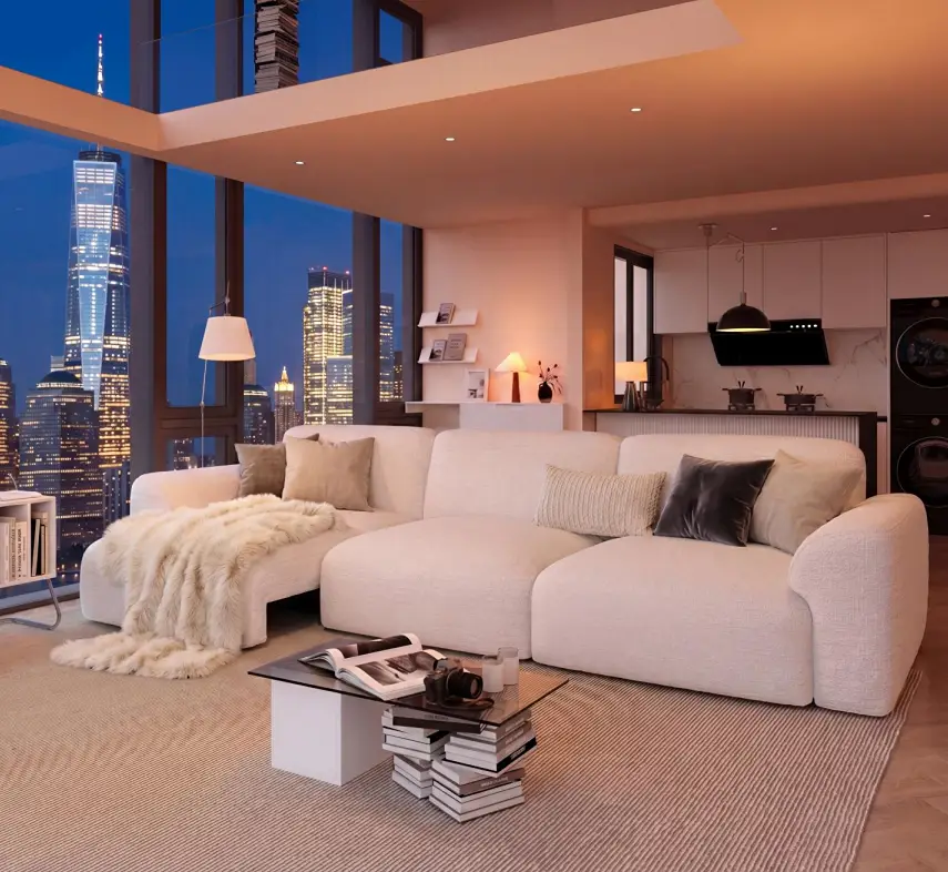 White sofa bed in a modern open-plan living room with floor-to-ceiling city views.
