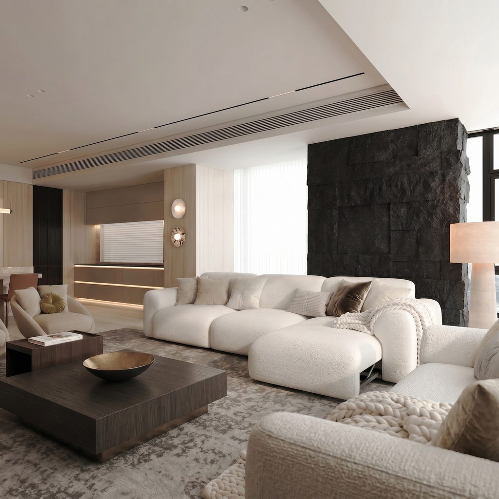 White modular sectional sofa with ottoman in a spacious, modern family living room.