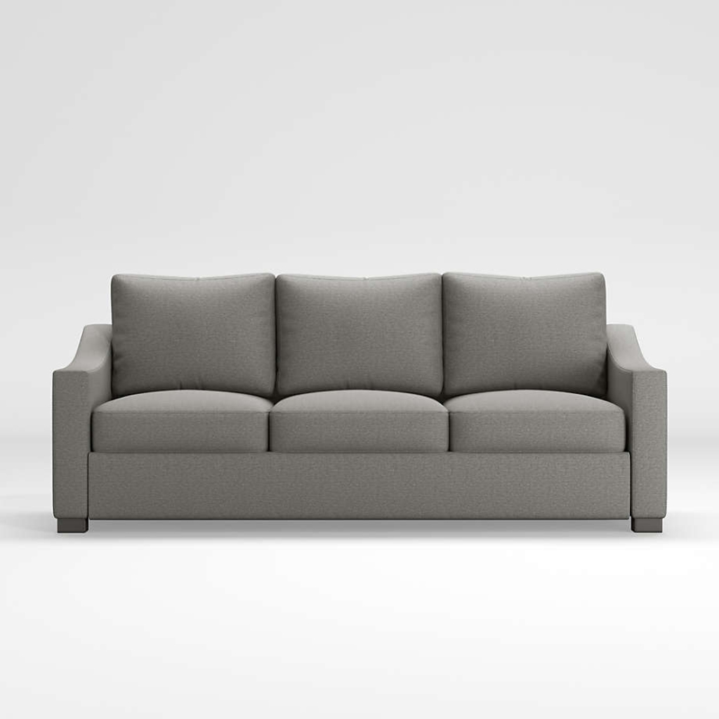 Gray three-seat sofa with plush cushions and clean modern lines on a simple white background.