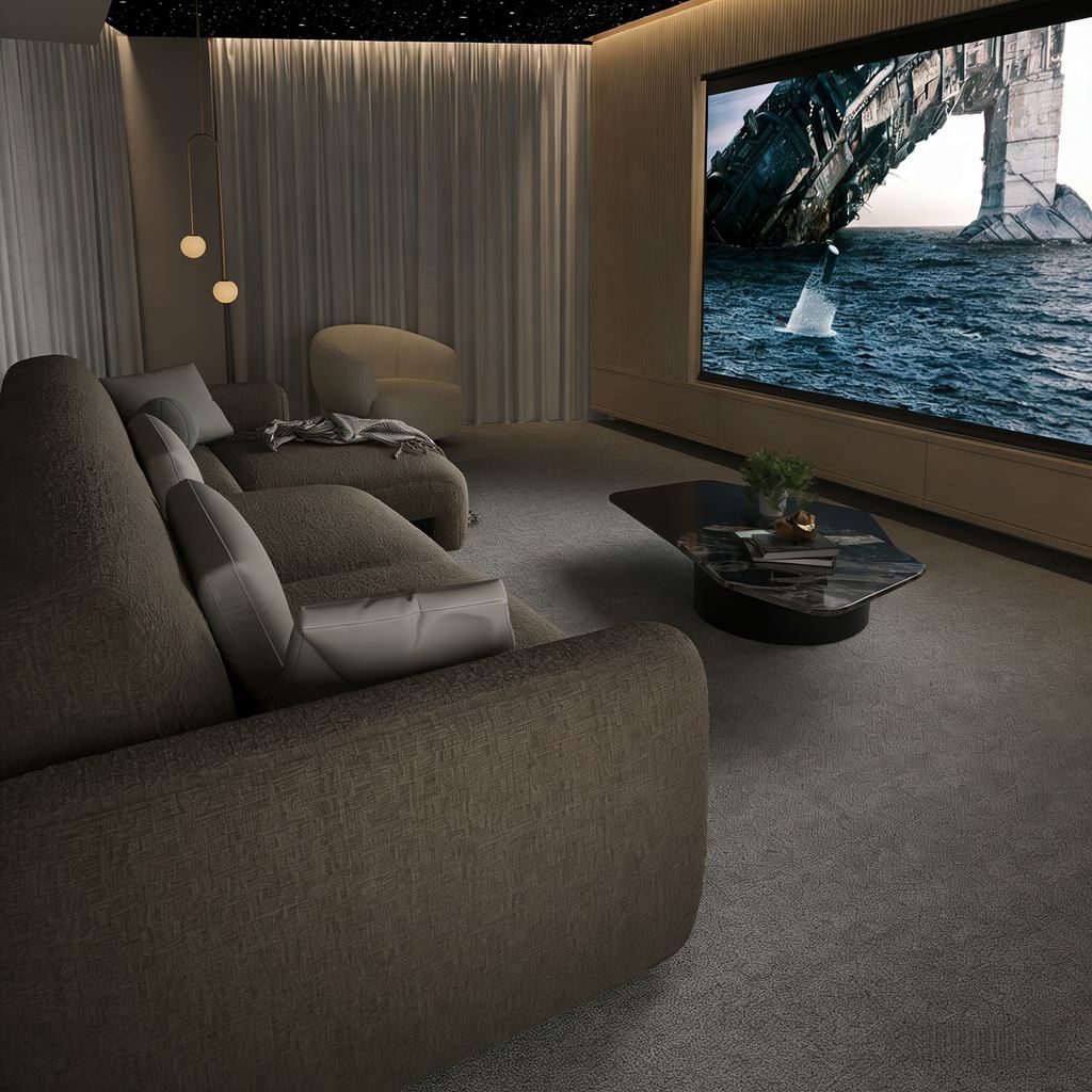 Cozy home theater with a large projection screen, deep upholstered sectional sofa, lounge chair, and low coffee table under soft ambient lighting.