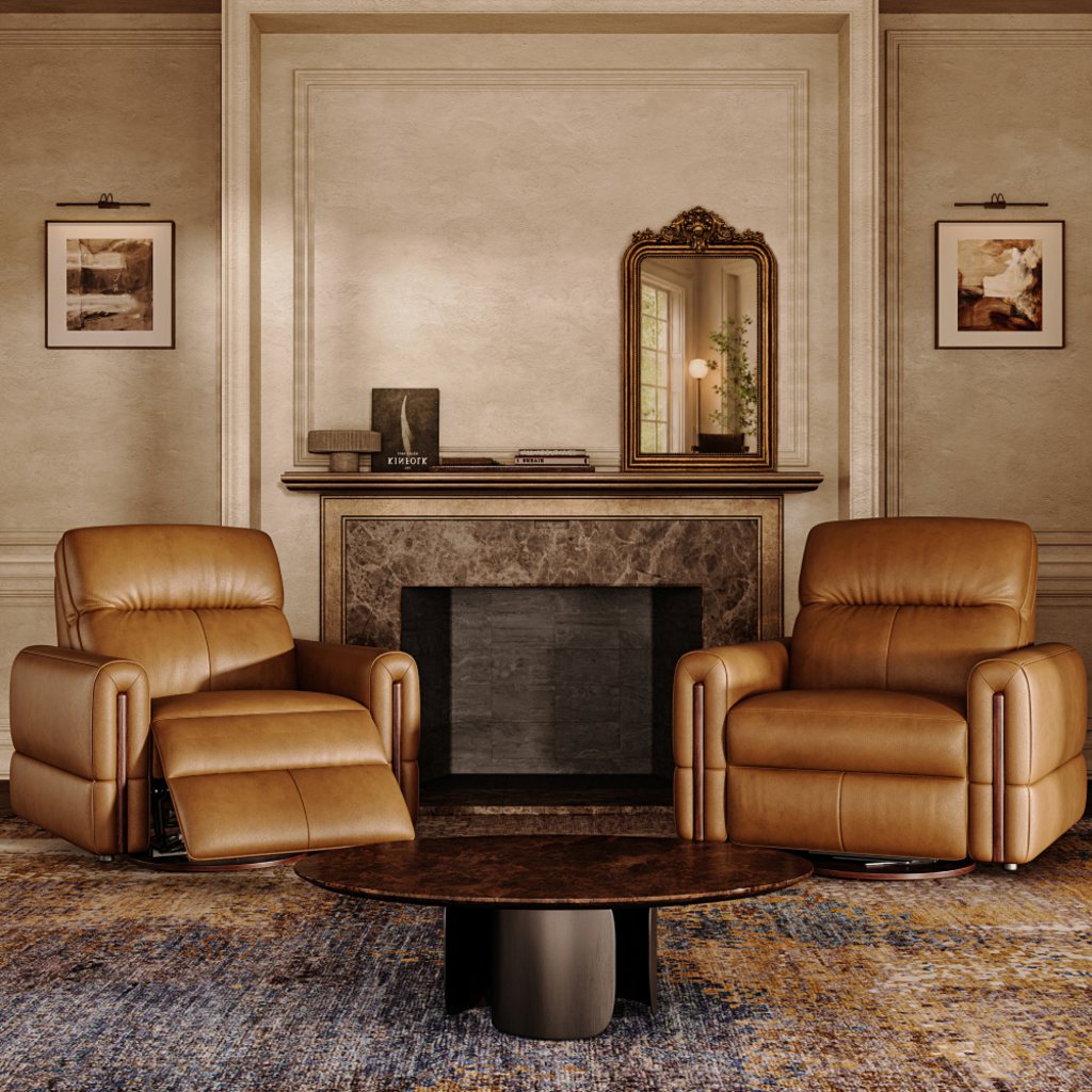 Two brown leather power recliners in a cozy den with a marble fireplace, round coffee table, and patterned area rug.