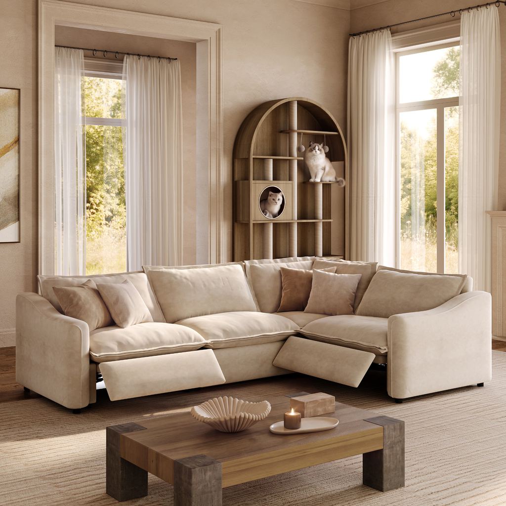 Beige L-shaped sectional sofa with reclining footrests in a sunlit living room, featuring a wooden coffee table and cat tree.